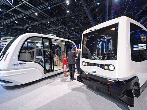 Exhibitors at Challenge Zone having a closer look at autonomous tranport, during the Self-Driving challenge awards, at Dubai World Challenge for Self-Driving Transport at Dubai World Trade Centre, Dubai.