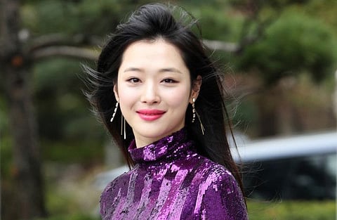 This undated photo released by Yonhap in Seoul on October 14, 2019 shows Sulli, a former member of top South Korean girl group f(x).  A popular K-pop star who had long been the target of abusive online comments was found dead at her home on October 14, South Korean police said. -  - South Korea OUT / REPUBLIC OF KOREA OUT  NO ARCHIVES  RESTRICTED TO SUBSCRIPTION USE    
 / AFP / YONHAP / - / REPUBLIC OF KOREA OUT  NO ARCHIVES  RESTRICTED TO SUBSCRIPTION USE