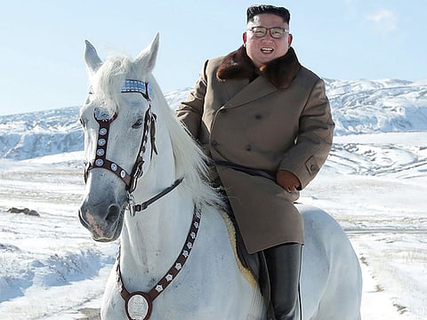 North Korean leader Kim Jong-un rides a horse during snowfall in Mount Paektu.