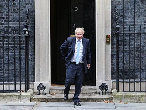 Britain's Prime Minister Boris Johnson comes out of 10 Downing Street in London on October 15, 2019 to greet Nato secretary general Jens Stoltenberg. Prime Minister Boris Johnson repeated on October 14 that Britain must leave the EU on October 31, as divorce talks resumed in Brussels in a pivotal week that could define how and when Brexit finally happens.