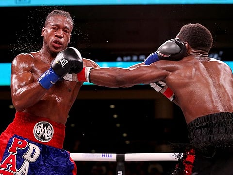 Patrick Day and Charles Conwell exchange punches in the seventh round of their Super-Weltereight bout at Wintrust Arena.