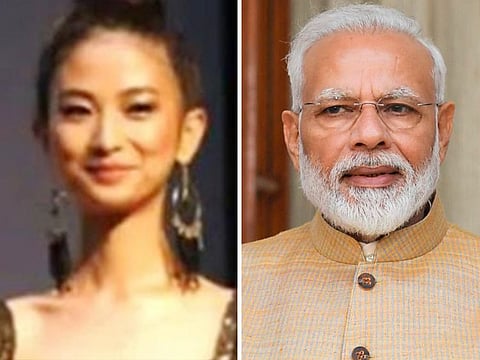 Vikuonuo Sachu and Narendra Modi.