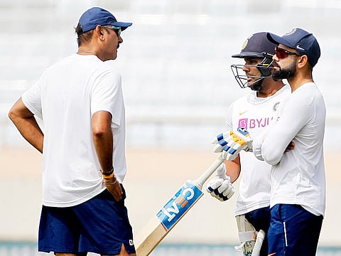 India's head coach Ravi Shastri, Virat Kohli, and Rohit Sharma during the practice session ahead of the 3rd test match against South Africa at JSCA Cricket Stadium, in Ranchi on Friday.
