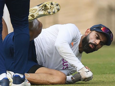 Virat Kohli takes part in a practice session at the Jharkhand State Cricket Association (JSCA) Stadium in Ranchi on October 18, 2019, ahead of the third and final Test match against South Africa.