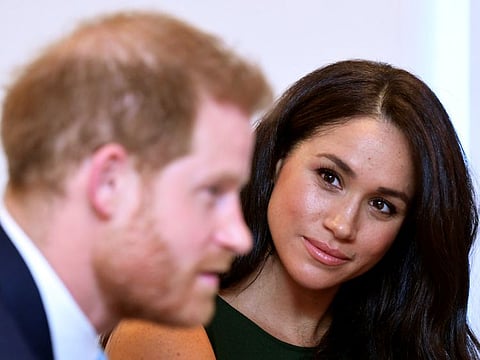 Meghan, Duchess of Sussex, looks at Britain's Prince Harry during the WellChild Awards pre-Ceremony reception in London, Britain, October 15, 2019. REUTERS/Toby Melville/Pool