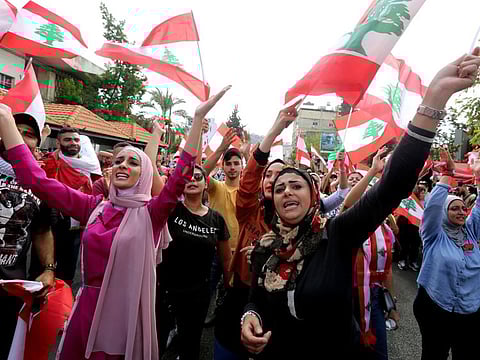 Demonstrators at an anti-government protest in the southern city of Nabatiyeh. Hariri’s 24-point blueprint proposes scrapping taxes on public services, reinstating cuts in salaries of retired military personnel and privatising the mobile phone sector.