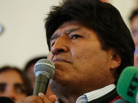 Bolivian President Evo Morales speaks to supporters at the presidential palace in La Paz, Bolivia, after a first round presidential election, Sunday, Oct. 20, 2019.