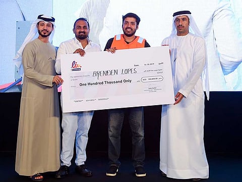 Dubai based Portuguese of Indian origin Brendon Lopez receives his prize in Dubai.