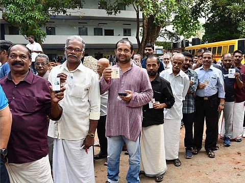 File picture: Voters wait in queues to cast their votes for the third phase of 2019 Lok Sabha elections in Thiruvananthapuram, Kerala on April 23, 2019.