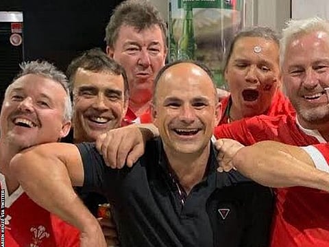 Jaco Peyper poses with Wales fans.