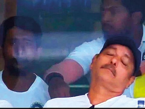 Ravi Shastri takes a nap.