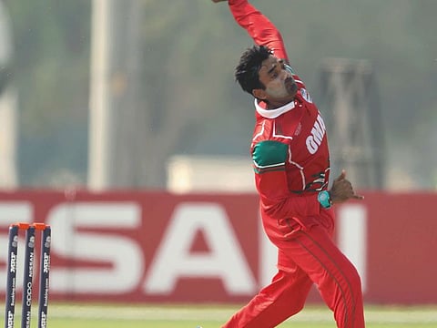 Oman's veteran spinner Aamir Kaleem in action against Nigeria in World T20 qualifier today.