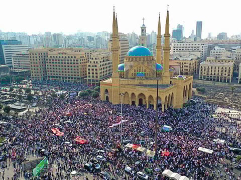 An areal view taken on October 20, 2019, shows Lebanese protesters rallying in downtown Beirut, on the fourth day of demonstrations against tax increases and official corruption.