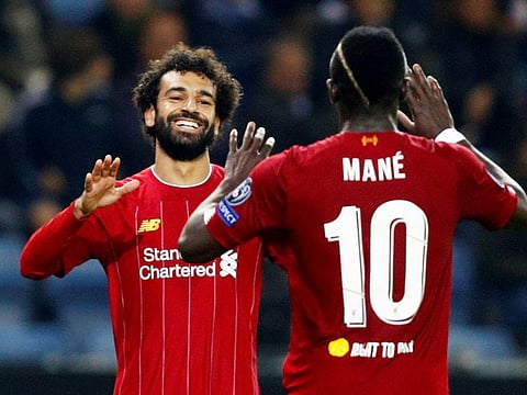 Liverpool's assistant manager Pepijn Lijnders feels that with their lynchpins Mohammed Salah (left) and Sadio Mane away on national duty, they are finding newer ways to attack.