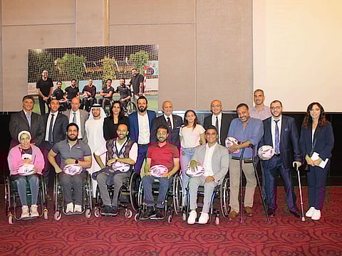UAE Rugby General Secretary Qais Al Dhalai with the wheelchair rugby team in Cairo.