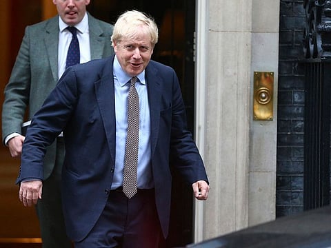 Britain's Prime Minister Boris Johnson leaves 10 Downing Street, on his way to parliament in London, Thursday Oct. 24, 2019.