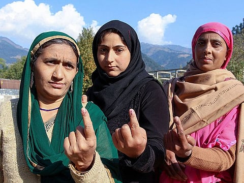 Female panches and sarpanches show their fingers marked with indelible ink after casting their votes during the first-ever Block Development Council elections, at a polling station in Boniyar area of Baramulla district of North Kashmir, Thursday, Oct. 24, 2019.
