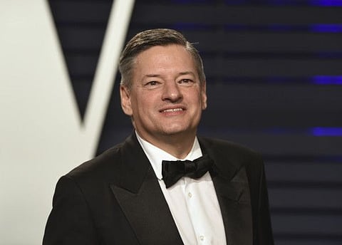 FILE - This Feb. 24, 2019 file photo shows Netflix chief Ted Sarandos at the Vanity Fair Oscar Party in Beverly Hills, Calif.