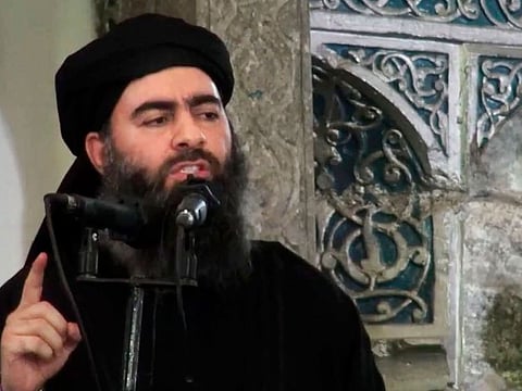 This file image made from video posted on a militant website Saturday, July 5, 2014, purports to show the leader of Daesh, Abu Bakr al-Baghdadi, delivering a sermon at a mosque in Iraq during his first public appearance.