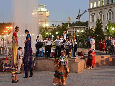 Lively evening with musicians and performers on Dusti square, Dushanbe, Tajikistan
