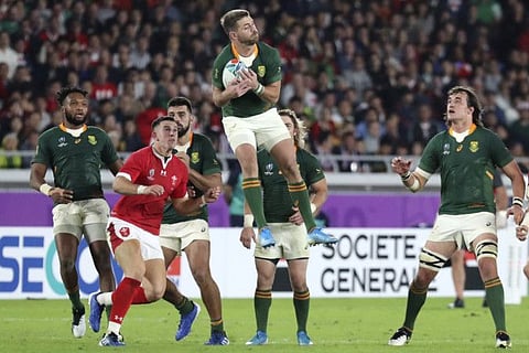 South Africa’s matchwinner Handre Pollard leaps to catch the ball during the Rugby World Cup semi-final against Wales on Sunday.