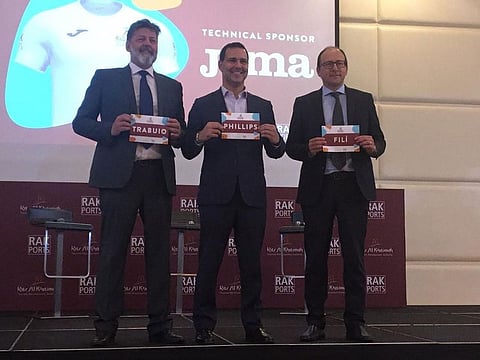 Raki Phillips (centre) is flanked by Andrea Trabuio (left) and Enrico Fili at the announcement of the 2020 RAK Marathon, on Monday.
