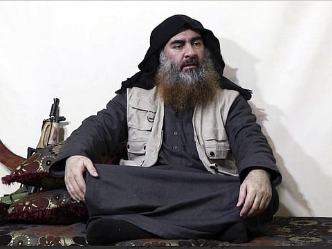 Undisclosed : FILE - This file image made from video posted on a militant website April 29, 2019, purports to show the leader of the Islamic State group, Abu Bakr al-Baghdadi, being interviewed by his group's Al-Furqan media outlet. The IS erupted from the chaos of Syria and Iraq's conflicts and swiftly did what no Islamic militant group had done before, conquering a giant stretch of territory and declaring itself a "caliphate." U.S. officials said late Saturday, Oct. 26, 2019 that al-Baghdadi was the target of an American raid in Syria and may have died in an explosion.AP/PTI(AP10_27_2019_000090B)