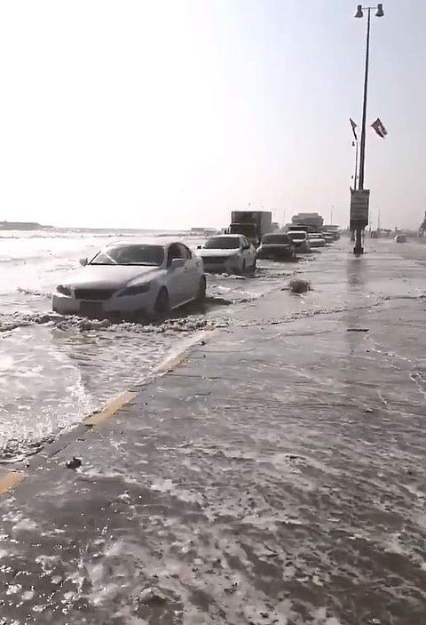 Corniche Roads in Khor Fakkan and Kalba were closed on Monday after midnight as high waves breached the barricade and flooded the surrounding streets amid an unusually high tide.
Kalba Road was closed in the direction of Fujairah. The other direction remains open for traffic.