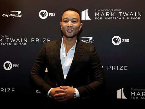John Legend arrives ahead of comedian Dave Chappelle receiving the Mark Twain Prize for American Humor at the Kennedy Center in Washington, U.S., October 27, 2019. REUTERS/Yuri Gripas