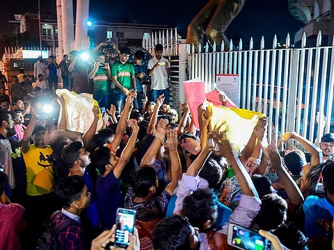 Cricket fans gather and shout slogans in front of the Sher-e-Bangla National Stadium in Dhaka on October 29, 2019, after Bangladesh national cricket team captain Shakib Al Hasan banned by the International Cricket Council (ICC) attended a press conference.