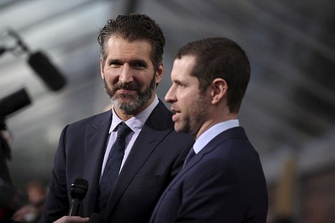 FILE PHOTO: David Benioff (L) and Dan Weiss, creators and executive producers, arrive for the season premiere of HBO's "Game of Thrones" in San Francisco, California March 23, 2015. REUTERS/Robert Galbraith/File Photo