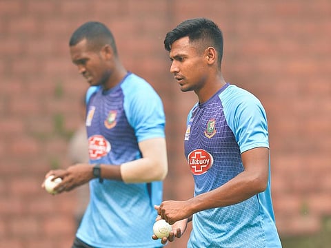 Bangladesh's Mustafizur Rahman (R) and Al-Amin Hossain prepare to deliver a ball during a practice session at Arun Jaitley Cricket Stadium in New Delhi on October 31, 2019, ahead of their first T20 international cricket match against India.