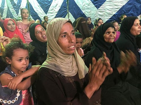 Audience members watch a performance of a comedy designed to teach farmers about climate change in the Upper Egyptian city of Assuit on September 13, 2019. Thomson Reuters Foundation/Menna A. Farouk