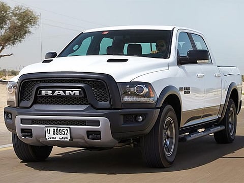 The traditional crosshair grille is ditched for an all-new blacked-out version featuring a prominent “RAM” letter badge.