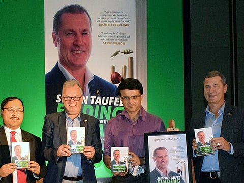 Simon Taufel (extreme right), five-time ICC Umpire of the Year, launches his book 'Finding the Gaps' in the company of Sourav Ganguly, president of Indian cricket board, in Kolkata on Saturday.