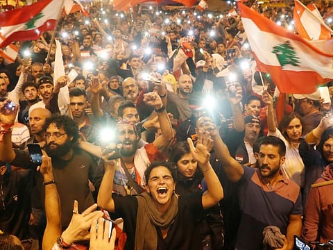 Demonstrators shout during a protest in Tripoli, Lebanon, November 2, 2019
