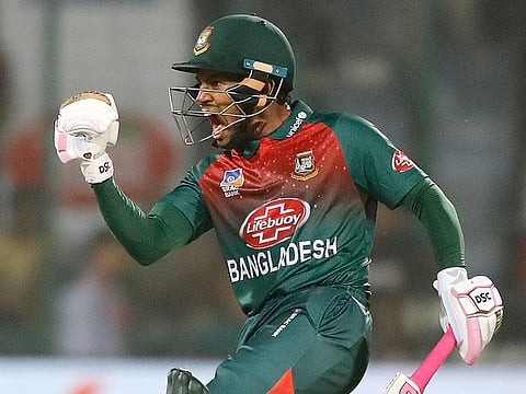 Bangladesh's Mushfiqur Rahim, right, celebrates after wining first T20 cricket match against India at the Arun Jaitley stadium, in New Delhi, on November 3, 2019.