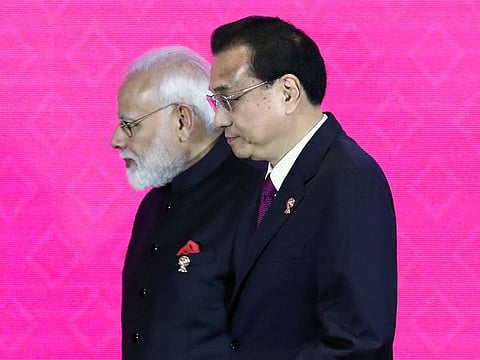 India's Prime Minister Narendra Modi and Chinese Premier Li Keqiang attend the 3rd Regional Comprehensive Economic Partnership (RCEP) summit in Bangkok, Thailand, November 4, 2019.