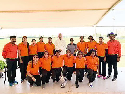 Navajo team pose with the trophy after winning the Dubai Cricket Council’s Women’s Cricket League.