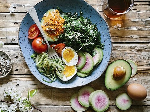 Practising mindful eating, which involves paying attention to hunger cues and savouring each bite, fosters a healthy relationship with food and helps in maintaining good health. Illustrative image.