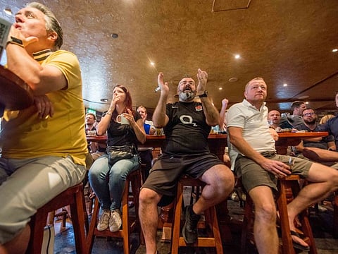 England rugby fans roar on their side during the World Cup final at the Crown & Lion, Byblos Hotel, in Barsha Heights.