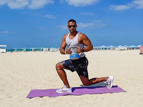 Fitness trainer Mostafa Mersal showing correct workout steps. Photo: Virendra Saklani/Gulf News