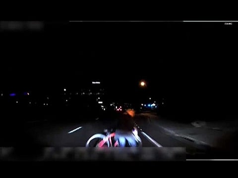 Video grab made from dashcam footage shows the moment before the collision of ride-sharing Uber's self-driving vehicle and a pedestrian in the city of Tempe, Arizona.