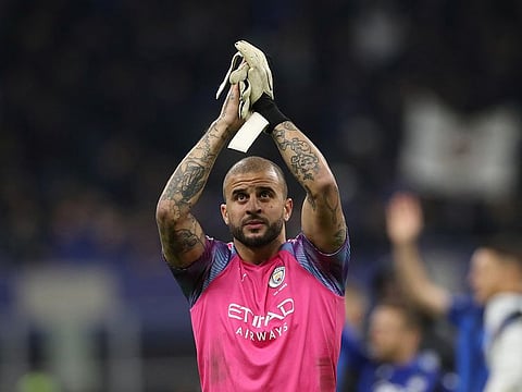 Manchester City's Kyle Walker applauds fans after the match.
