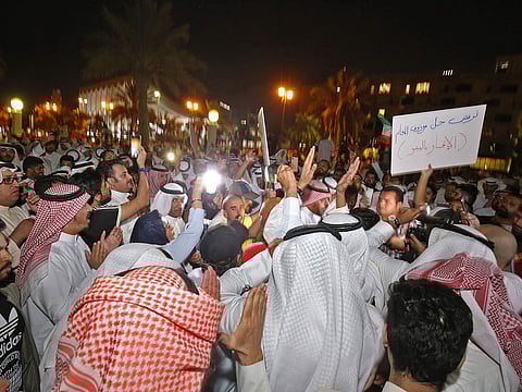 Kuwaiti demonstrators take part in a demonstration against corruption in Kuwait City