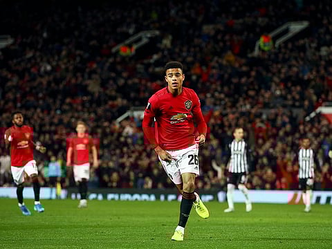 Manchester United's Mason Greenwood celebrates after scoring the opening goal.