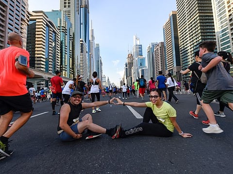 Roan Soliven Rubang and Christopher Yeyes getting the feel of Sheikh Zayed road at Dubai Run 30X30 on Friday 08 November 2019. Photo: Virendra Saklani/Gulf News