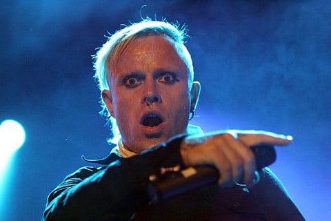 FILE PHOTO: Prodigy vocalist Keith Flint performs at the Gurten Festival near Berne, July 15, 2005. Some 16,000 people attend the three-day long festival which takes place on the Gurten hill. Picture taken July 15.