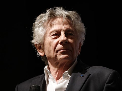 French Polish director Roman Polanski looks on on stage after the preview of his last movie "J'accuse" (An Officer and a Spy) in Paris, on November 4, 2019.