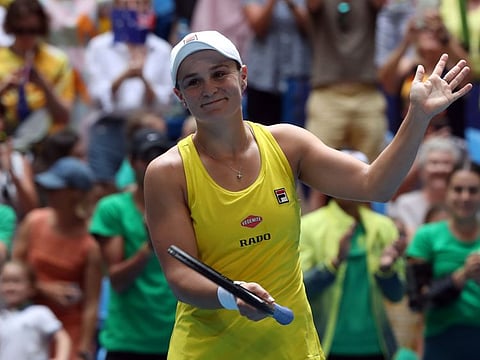 World No.1 Ashleigh Barty of Australia celebrates after victory against Caroline Garcia of France in Perth on Saturday.